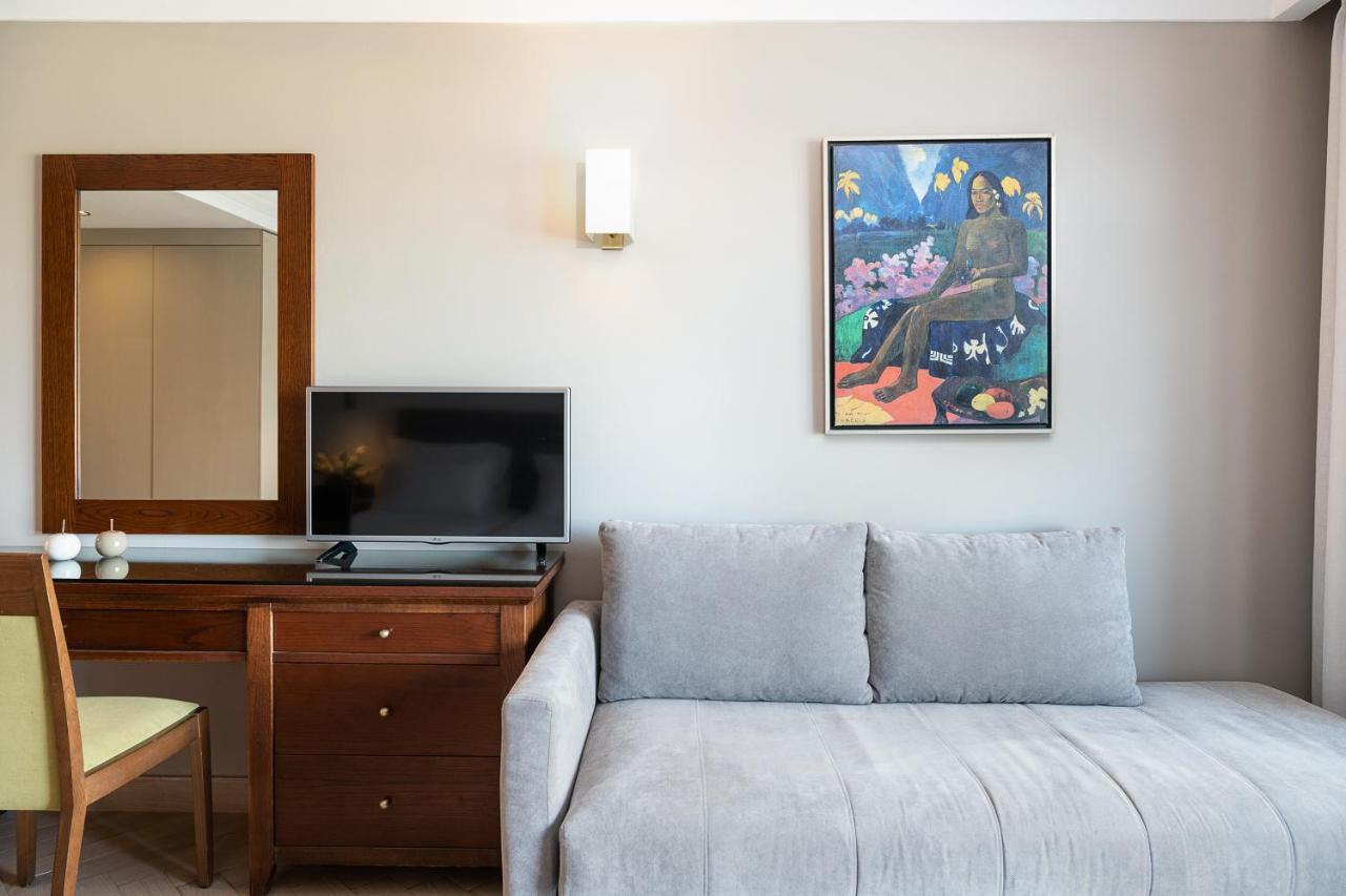 Porto Platanias Beach Resort & Spa Platanés Exterior foto A painting by the artist
